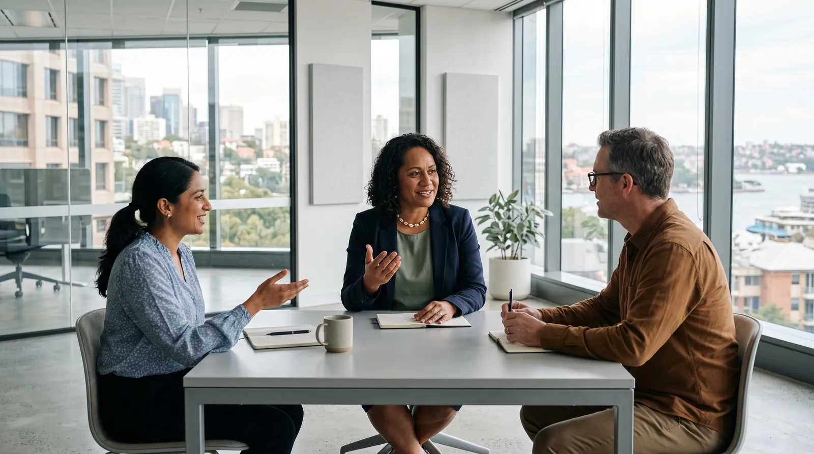 A modern leader guiding her team through a discussion